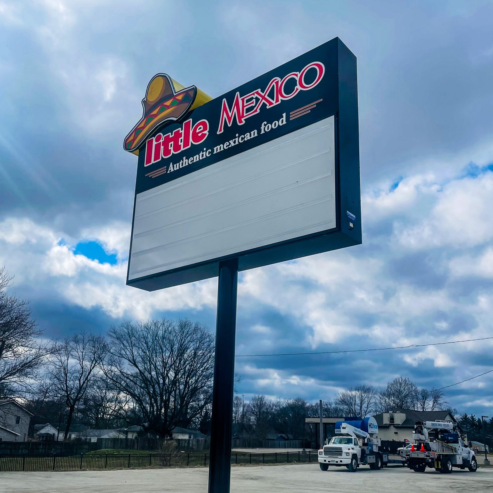 Illuminated pylon sign for Little Mexico