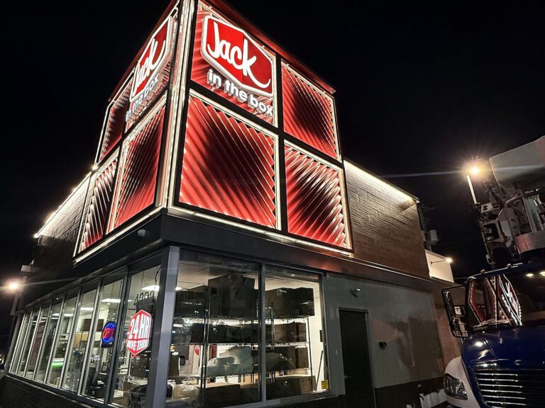 Channel letter sign for Jack in the Box in St. Louis, MO, illuminated at night
