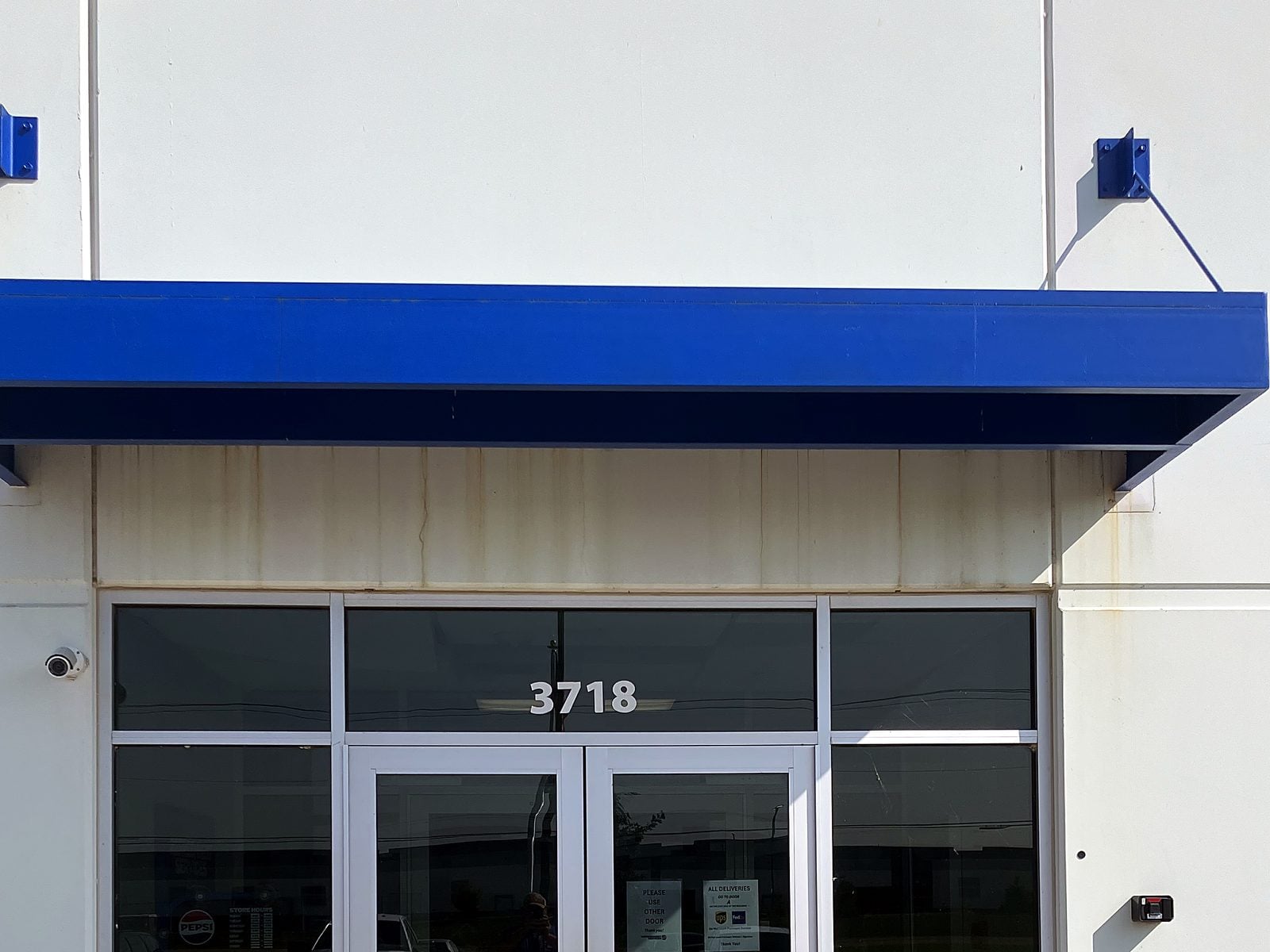 Blue fabric entrance awning in Decatur, IL