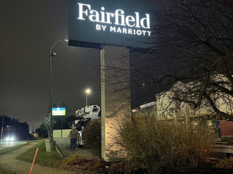 Pylon sign for Fairfield by Marriott in Forsyth, IL, illuminated at night