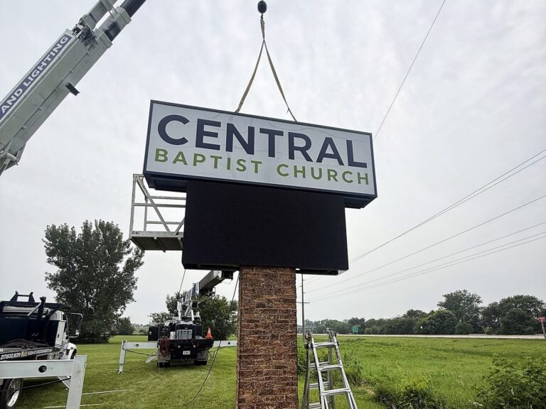 Signature Signs installation crew installing the Central Baptist Church sign