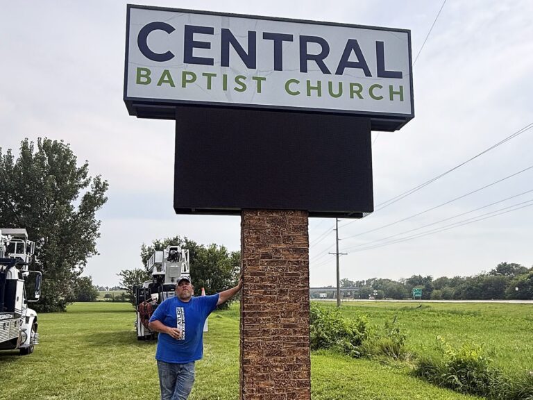 Signature Signs installation crew installing the Central Baptist Church sign – view 2