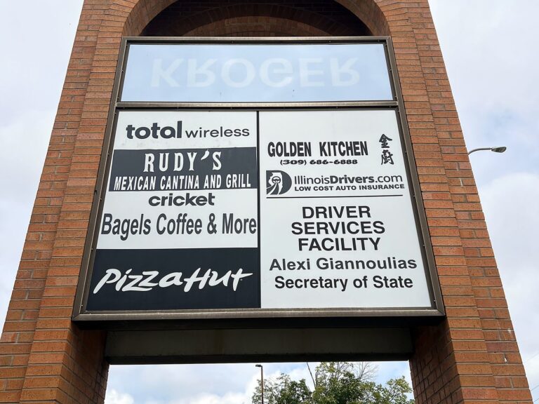 Signature Signs installation crew in Peoria, IL – view 2