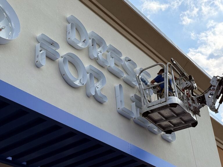 Signature Signs installation crew installing the Ross Dress for Less sign in Pekin, IL – view 2